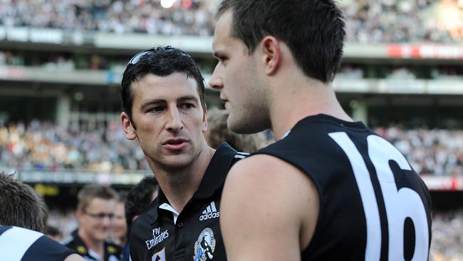 Simon Prestigiacomo with Nathan Brown after the 2010 Grand Final replay.