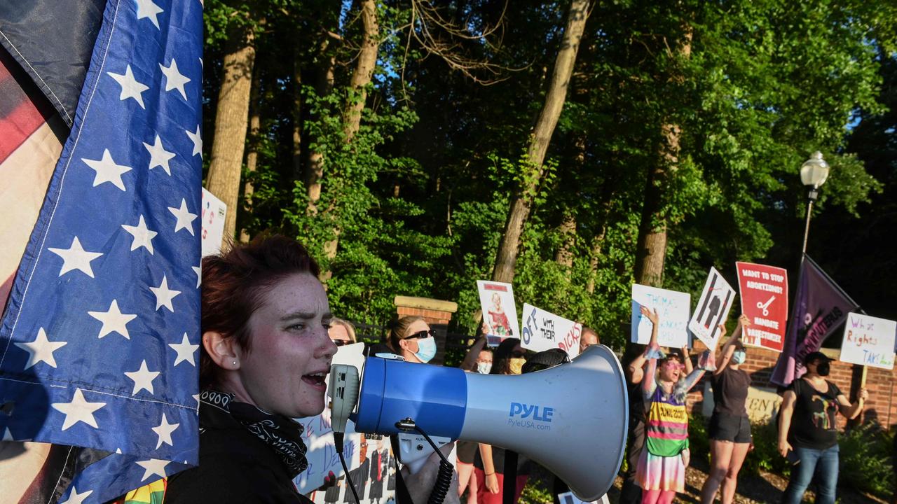 Demonstrators outside of Supreme Court Justice Clarence Thomas’ house called his wife Ginni an “insurrectionist.” Picture: Roberto Schmidt/AFP