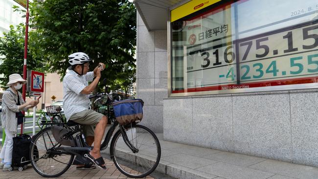 The plunge on Wall Street spilled over to Asia-Pacific markets on Monday, with Japan’s Nikkei 225 index plunging 12.4 per cent in its biggest single-day fall since 1987. Picture: Getty Images