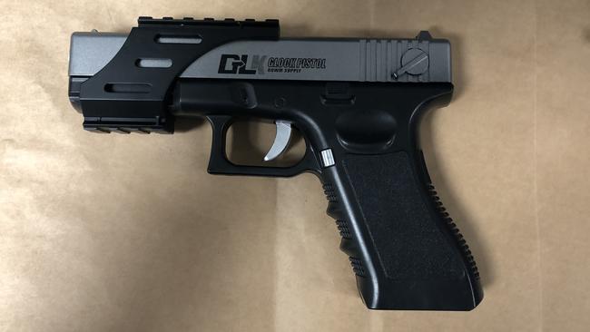 A Glock-18 replica 'Gel Blaster' pistol seized from a man by Northern Beaches Police after receiving a triple zero call from a member of the public reporting seeing a man with a gun at a popular beach lookout. Picture: NSW Police