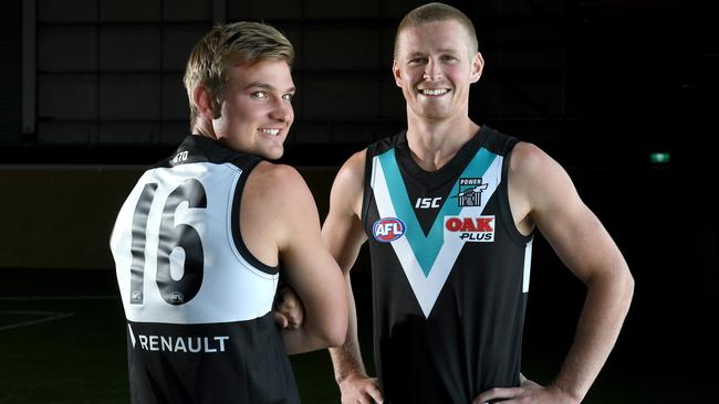 Port Adelaide’s Ollie Wines and Tom Clurey model their new jumper. Picture: Tricia Watkinson