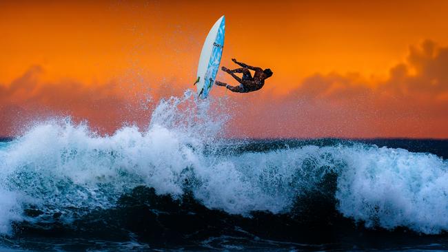 HANDOUT // Sony World Photography Awards, Open Category Winners and Shortlist // Pictured:    I took this at Hikkaduwa in Sri Lanka. There was a fantastic sunset and a lot of people were surfing, so I grabbed my camera and went to photograph the action. I tracked this kid as he showed off his skills and captured this moment. // CREDIT:  Thusitha Jayasundara // DO NOT CROP OR ALTER. ONE TIME USE ONLY. MUST CREDIT PHOTOGRAPHER.