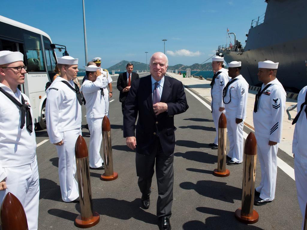 US Senator John McCain (C) visits the forward-deployed Arleigh Burke-class guided-missile destroyer USS John S. McCain in 2017. Picture: AFP