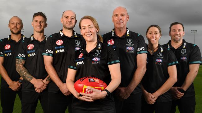 Port Adelaide’s inaugural AFLW coaching panel: (L-R) Cam Sutcliffe (player development coach), Hamish Hartlett (assistant coach), Dave Reynolds (assistant coach), Lauren Arnell (head coach), Clayton Lamb (player development coach), Renee Forth (player development coach), Daniel Care (assistant coach), pictured at Alberton Oval on May 25, 2022. Picture: Tricia Watkinson