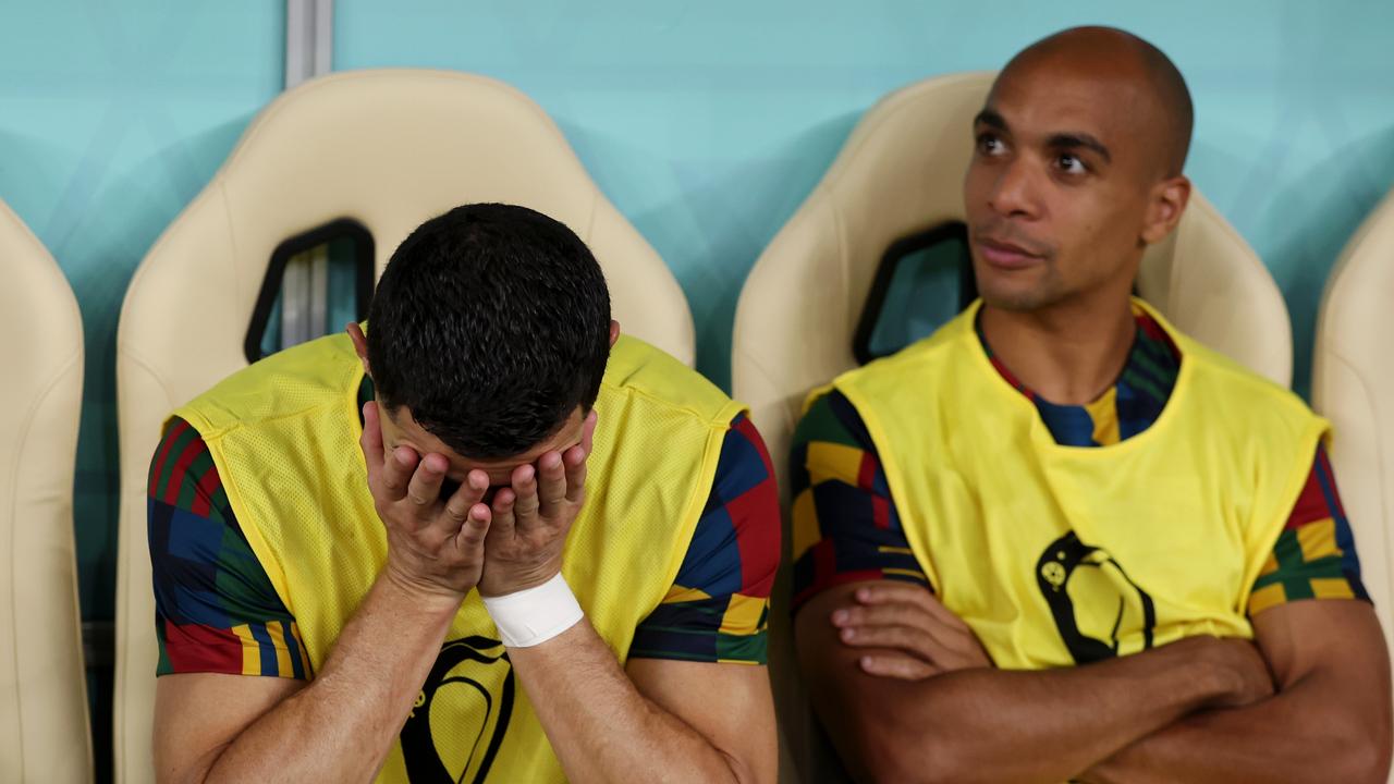 Cristiano Ronaldo of Portugal looks on from the bench.