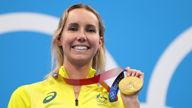 Australian swimmer Emma McKeon celebrates another gold medal on the podium. Picture: Getty Images