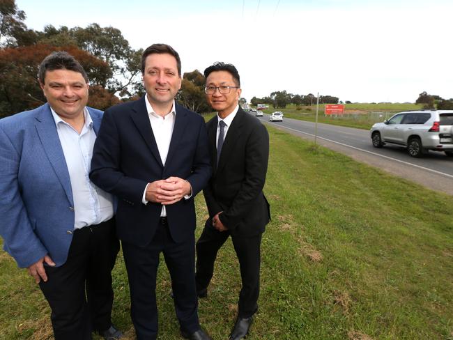 Liberals pledge $125m for second stage of the Barwon Heads Rd duplication Opposition leader Matthew Guy (middle) with Liberal candidate for South Barwon Andrew Katos and Liberal candidate for Bellarine Donnie Grigau. Picture: Mike Dugdale