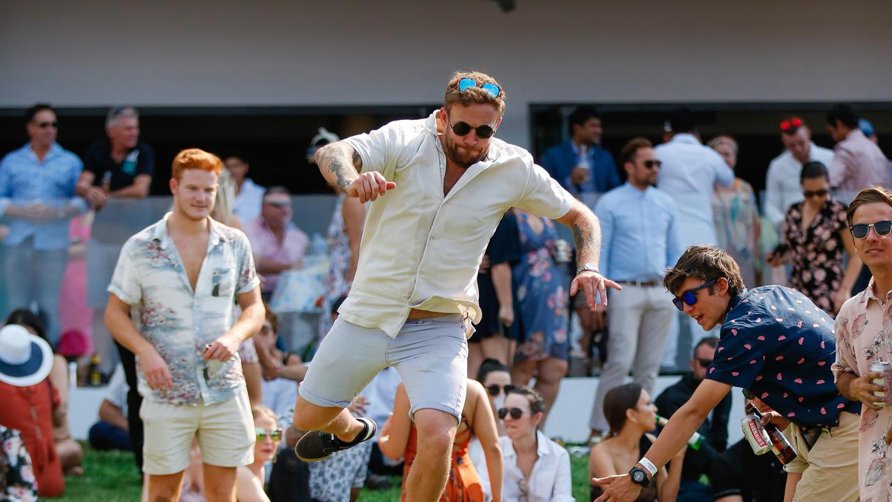 Jack Maybank jumping for joy as punters enjoy the 2020 Great Northern Darwin Cup. Picture: GLENN CAMPBELL