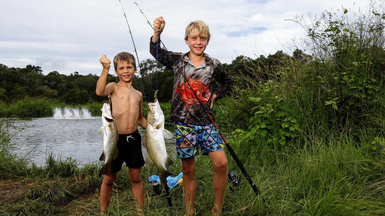 The Kuranda Fish Farm at Speewah is closing, with around 3000 barramundi left in one pond ready to be caught. Keen anglers such as brothers Dylan Zopponi, 8, and Tahne Zopponi, 11, are lining up to catch the fish. Picture: Brendan Radke