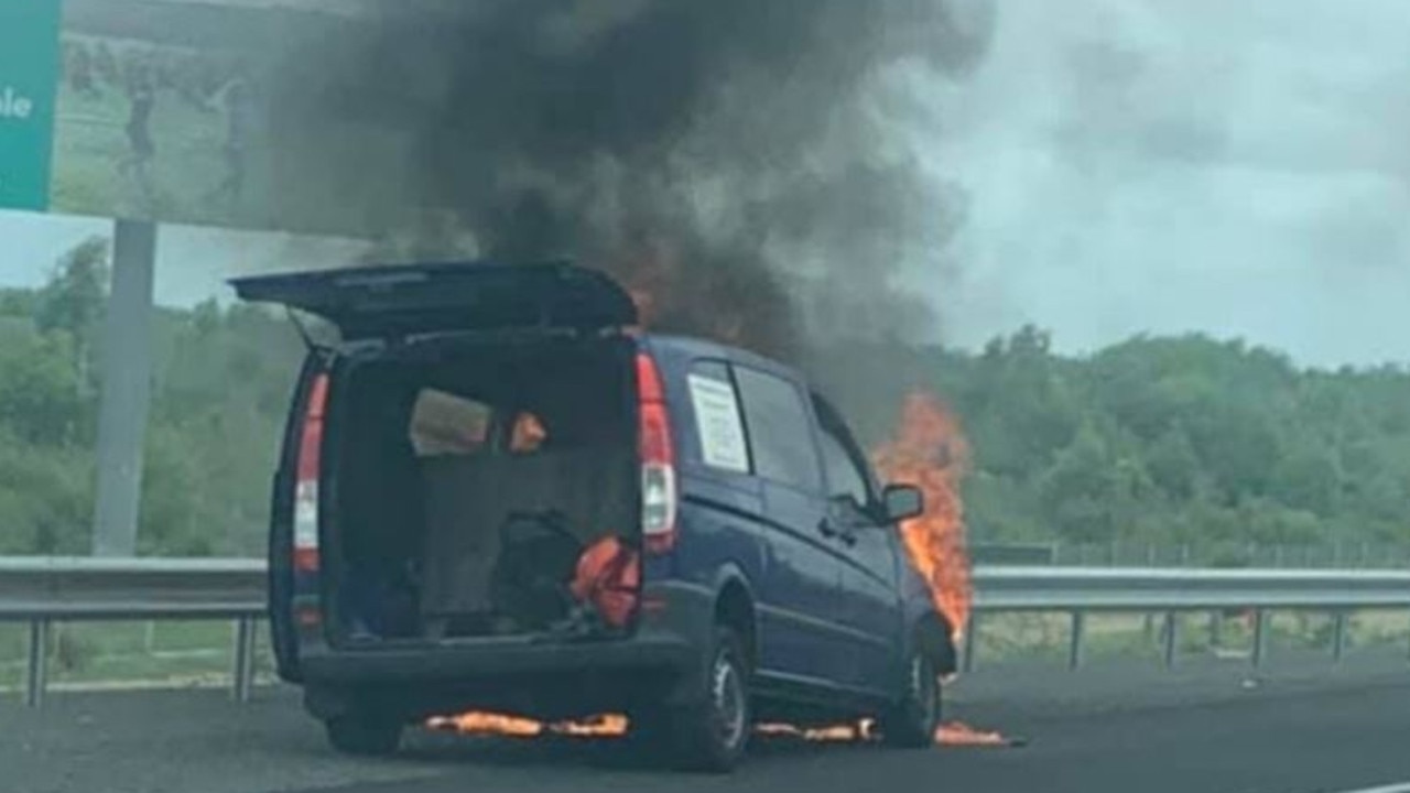 A van caught fire on the Bruce Highway southbound near Aussie World. Picture: Amy Jayde