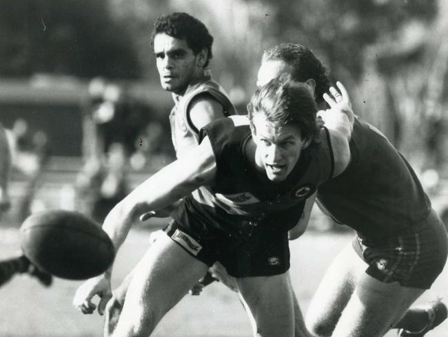 Kieran Sporn under pressure for West Adelaide in 1988.