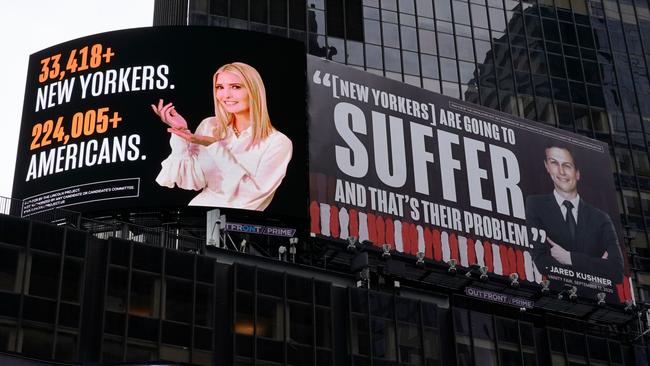 The offending billboards on Times Square on Monday. Picture: AFP