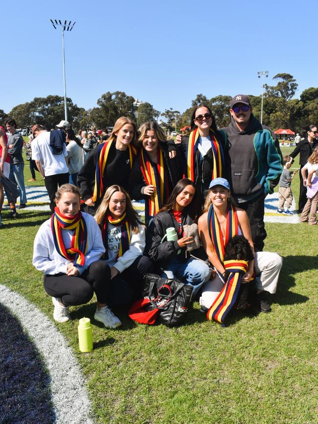 The Victorian Amateur Football Association (VAFA) William Buck Premier Men’s Grand Final Match — Old Brighton vs. Old Scotch — Friday, September 27, 2024: Left to right: Holly Larkin, Alex Croft, Abbie Connor, Eddie Montgomery, Amy Gration, Holly Smith, Ella Crump, Lucy Morley and Leo. Picture: Jack Colantuono