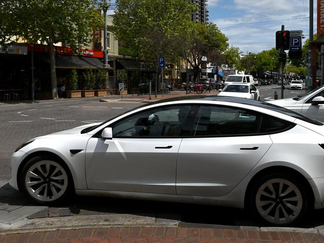 ADELAIDE, AUSTRALIA - NewsWire Photos October 20, 2022: Generic photos of electric cars and charging stations. Tesla on Gouger Street.Debate over repeal of electric vehicle levy to continue/ conclude in SA lower house. The tax forces electric vehicle owners to pay a 2.5 cent per kilometre mileage charge on zero-emission vehicles in lieu of the fuel excise not being paid. Axing the tax was an election promise of LaborÃs Peter Malinauskas. Picture: NCA NewsWire / Naomi Jellicoe