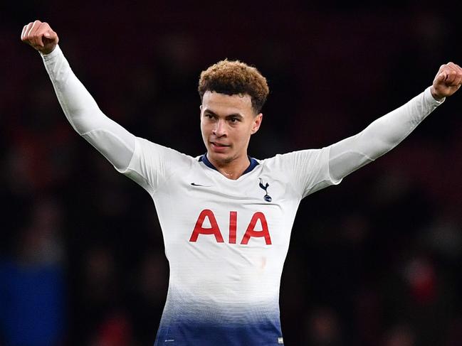 Tottenham Hotspur's English midfielder Dele Alli celebrates at the final whistle of the English League Cup quarter-final football match between Arsenal and Tottenham Hotspur at the Emirates Stadium in London on December 19, 2018. (Photo by Ben STANSALL / AFP) / RESTRICTED TO EDITORIAL USE. No use with unauthorized audio, video, data, fixture lists, club/league logos or 'live' services. Online in-match use limited to 120 images. An additional 40 images may be used in extra time. No video emulation. Social media in-match use limited to 120 images. An additional 40 images may be used in extra time. No use in betting publications, games or single club/league/player publications. /