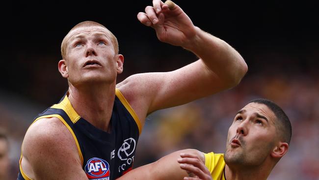 Sam Jacobs rucks against Shaun Grigg contest the boundary throw in. Picture: Michael Klein