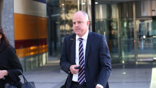 Suncorp executive David Carter leaves the royal commission in Melbourne yesterday. Picture: AAP