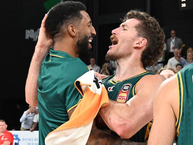 HOBART, AUSTRALIA - MARCH 11: Will Magnay and Marcus Lee of the Jackjumpers celebrate the win during game two of the NBL semifinal series between Tasmania Jackjumpers and Perth Wildcats at MyState Bank Arena, on March 11, 2024, in Hobart, Australia. (Photo by Steve Bell/Getty Images)