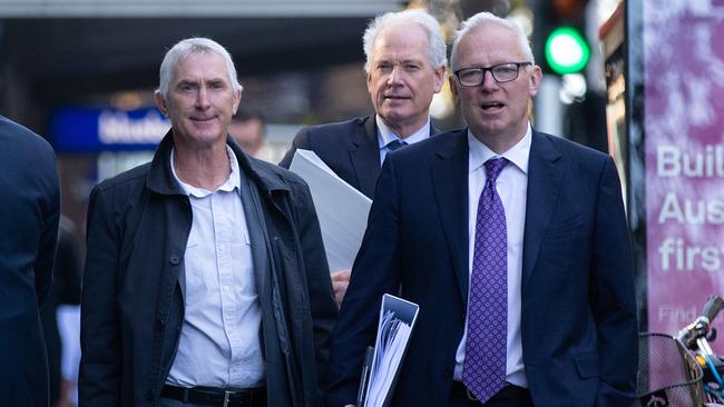 Wayne Strawhorn, left, arrives to front the commission. Picture: Sarah Matray