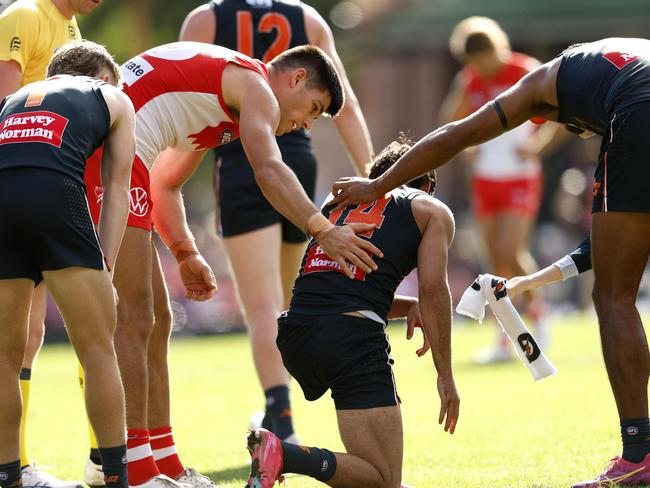 Lewis Melican checks on Toby Bedford after a clash on the SCG. Picture: Phil Hillyard.