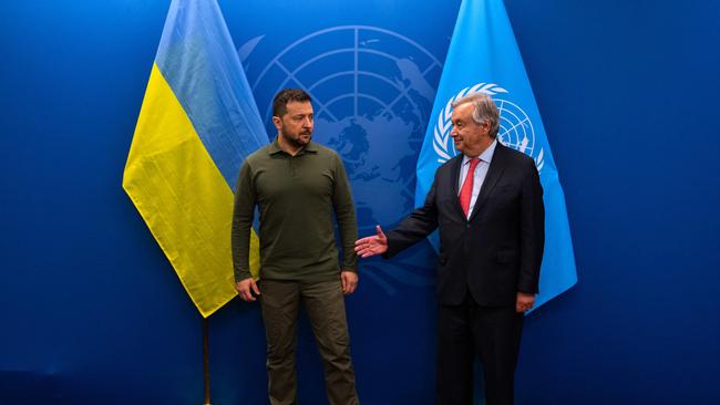 President of Ukraine Volodymyr Zelensky prepares to shake hands with United Nations Secretary-General Antonio Guterres. Picture: AFP