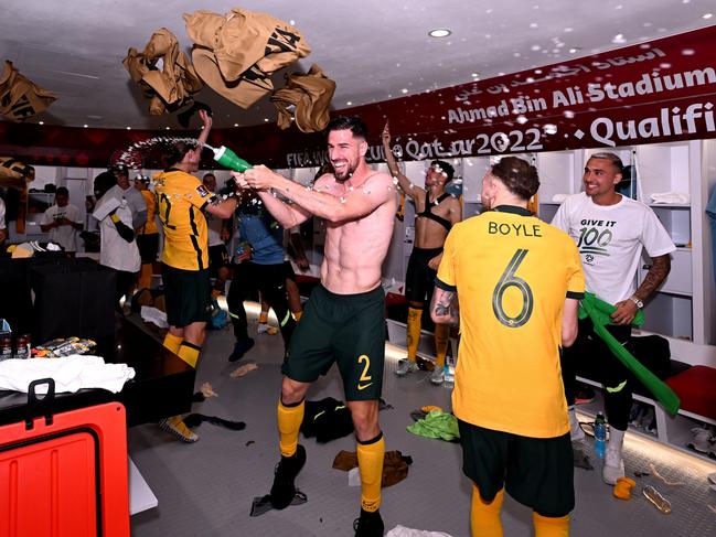 Milos Degenek (centre) celebrates after the Socceroos’ successful World Cup playoffs campaign in June. Picture: Joe Allison/Getty Images