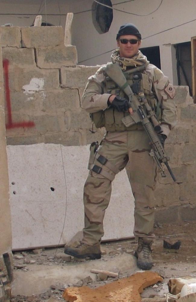 Chris Kyle kitted up with his MK-12 sniper rifle, which he was carrying when he rescued the trapped Marines and reporters in Fallujah.