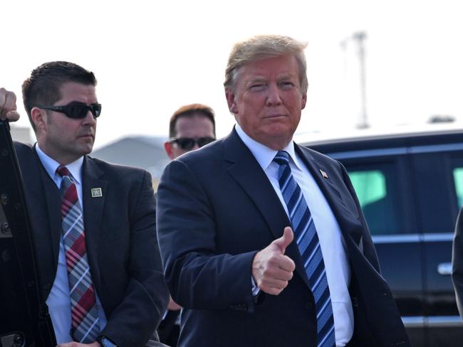 US President Donald Trump waves as he arrives to Billings, Montana for a rally on September 6, 2018. (Photo by Nicholas Kamm / AFP)