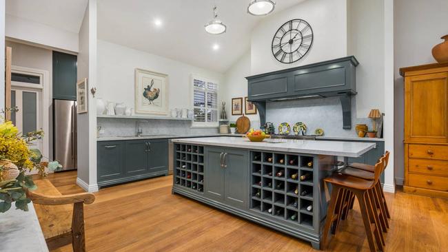 Sweet kitchen, but given this home’s isolation, you’d probably want double the wine storage …