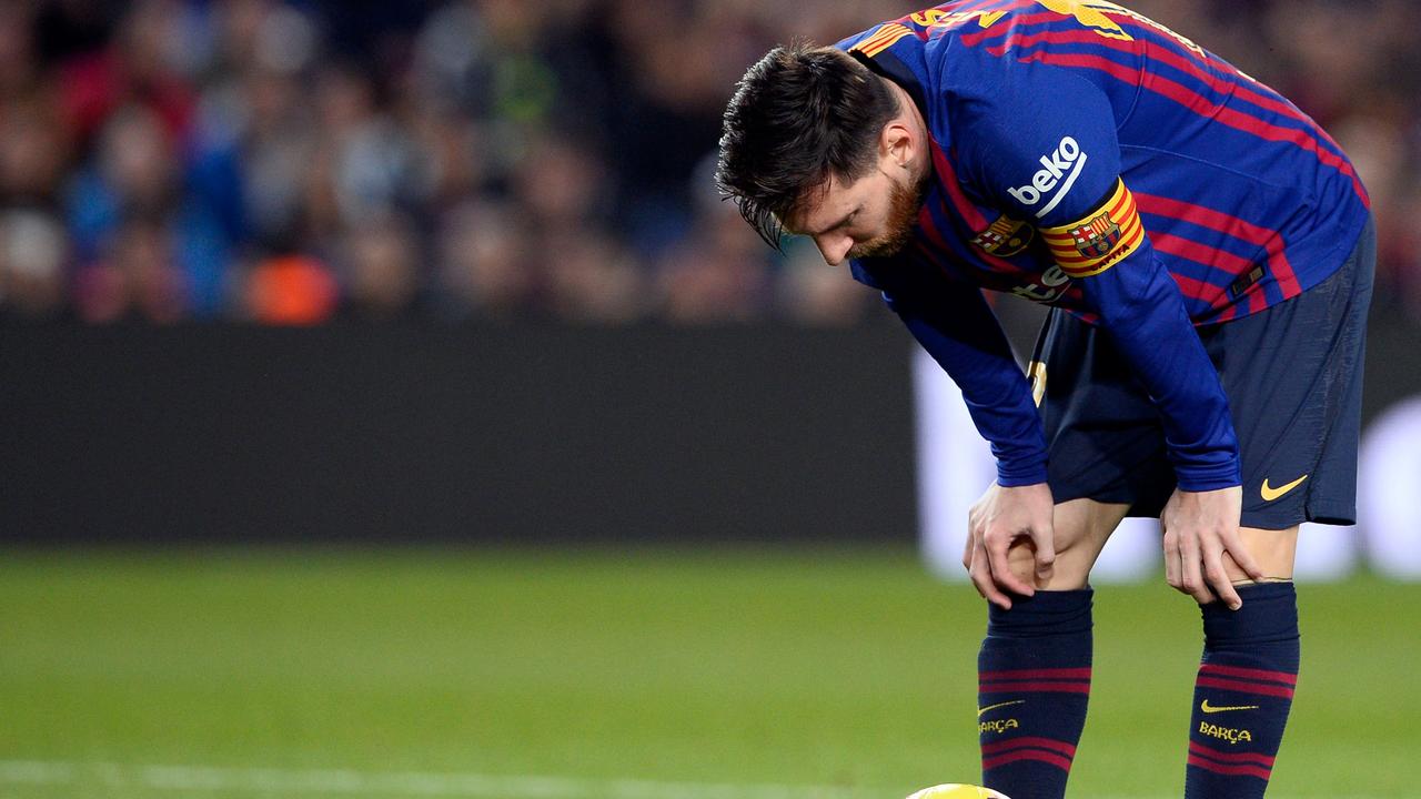 Lionel Messi scored twice on his return from a broken arm, but Barcelona were beaten by Real Betis.