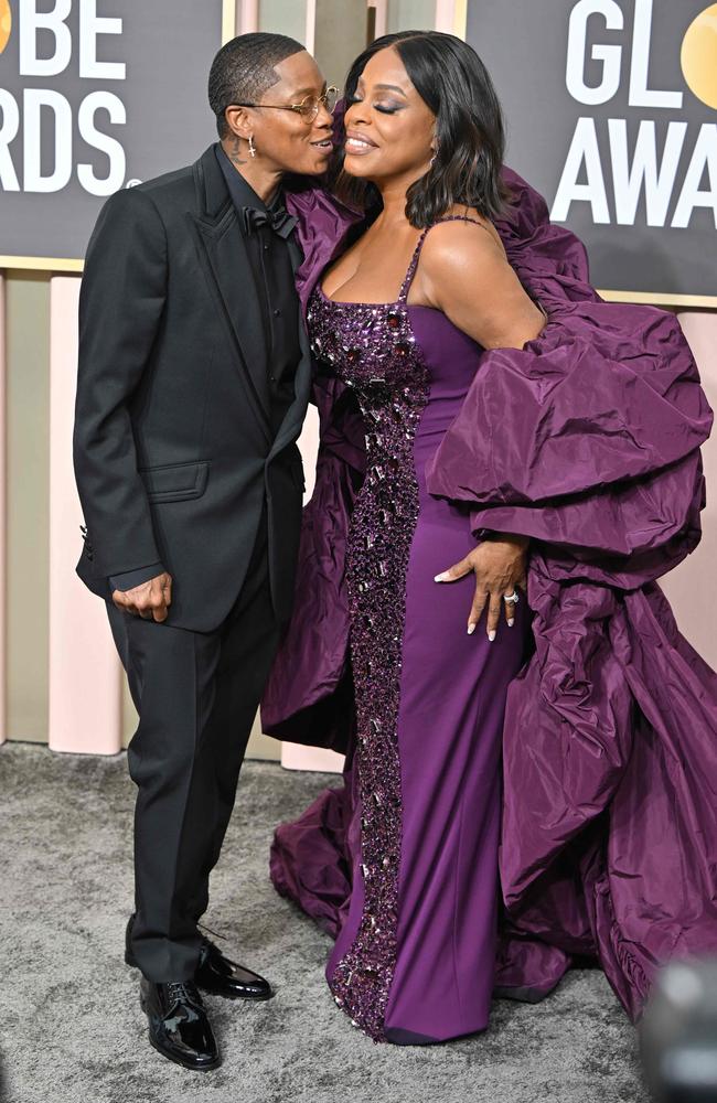 US singer Jessica Betts and US actress Niecy Nash arrive for the 80th annual Golden Globe Awards. Picture: AFP