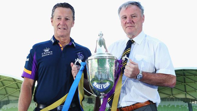 Melbourne Storm Head Coach Craig Bellamy (L) and Leeds Rhino's CEO Gary Hetherington pose with the World Club Challenge Trophy.