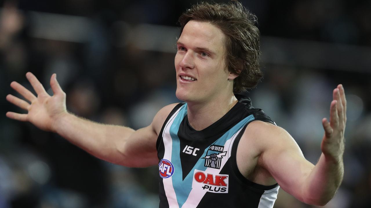 Jared Polec celebrates his goal with the crowd this season.