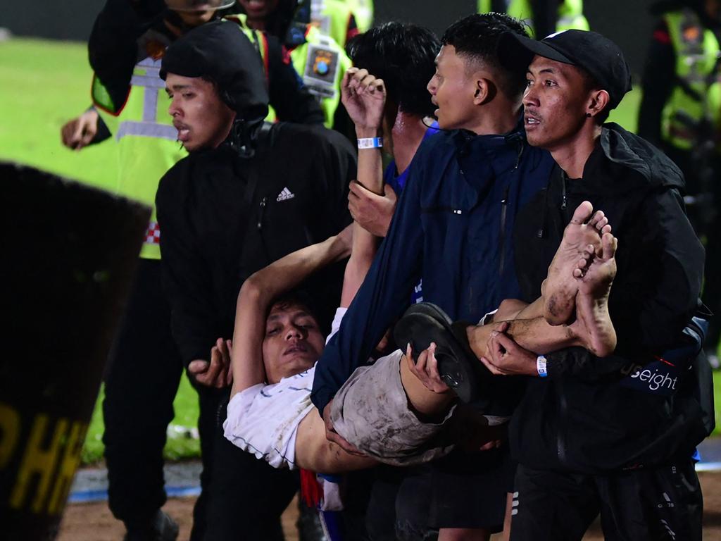 Indonesia soccer tragedy At least 125 dead in stampede The Courier Mail