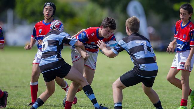 Under-14 and Under-15 finals of the King of the Country rugby union tournament at Gold Coast Eagles Rugby Union Club on Sunday 10 April 2022. Under 14's playing for 3rd place, Bond Pirates (Red) vs Maroochydore Swans. Picture: Jerad Williams