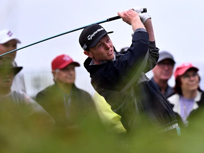 Ryggs Johnston tees off at the Australian Open. Picture: AFP