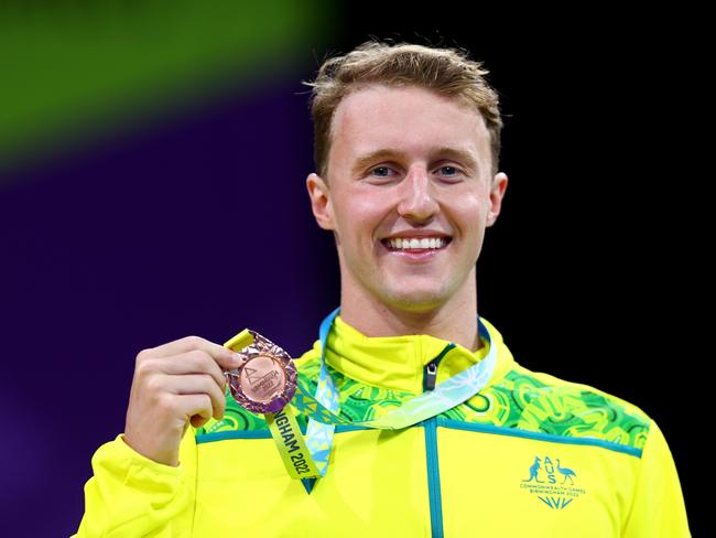 SMETHWICK, ENGLAND – JULY 30: Bronze medallist, Elijah Winnington of Team Australia poses with their medal during the medal ceremony for the Men's 200m Freestyle Final on day two of the Birmingham 2022 Commonwealth Games at Sandwell Aquatics Centre on July 30, 2022 on the Smethwick, England. (Photo by Dean Mouhtaropoulos/Getty Images)