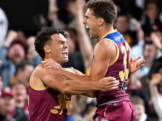 BRISBANE, AUSTRALIA - SEPTEMBER 09: Zac Bailey of the Lions celebrates with team mate Cam Rayner after kicking a goal during the Second Qualifying Final AFL match between the Brisbane Lions and Port Adelaide Power at The Gabba, on September 09, 2023, in Brisbane, Australia. (Photo by Bradley Kanaris/Getty Images)