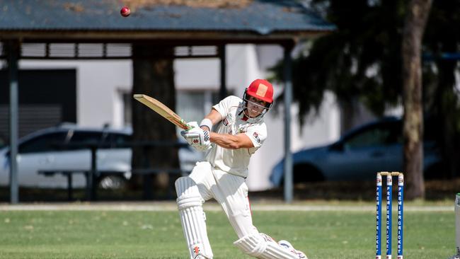 Ben Pengelley cracks a 4 at Glandore Oval against Kensington on Saturday. Picture: AAP/Morgan Sette