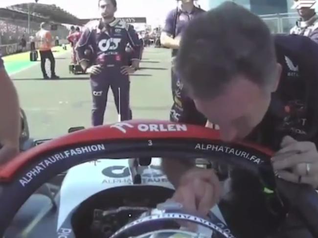 Christian Horner shakes Daniel Ricciardo's hand before the Hungarian Grand Prix.