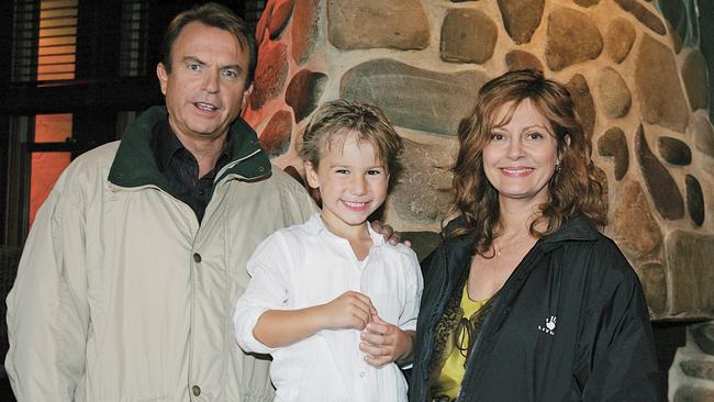 Sam Neill and Susan Sarandon with a young fan in Melbourne, where they were shooting the film Irresistible in 2005. (Picture: Supplied)