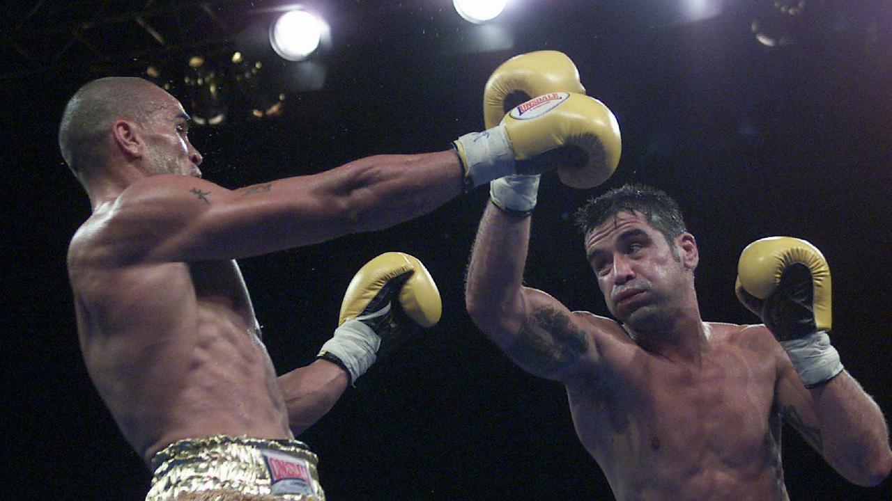 Marc Bargero (right) in a boxing match with Anthony Mundine during the heights of their careers.