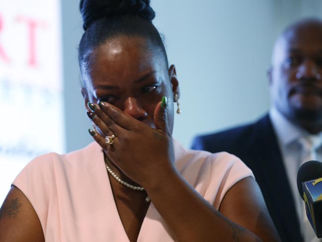 Tomika Miller, the widow of Rayshard Brooks, wipes away tears as she participates in a press conference at her lawyers office. Picture: Getty Images