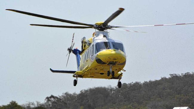 ON SCENE: Police, Fire, Ambulance and a rescue helicopter were tasked to the scene of a truck rollover at Boyne Valley. Picture: Tobi Loftus