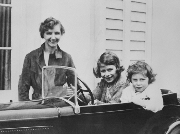 Princess Elizabeth and her younger sister Princess Margaret with their governess Marion Crawford. Picture: Bettmann/CORBIS