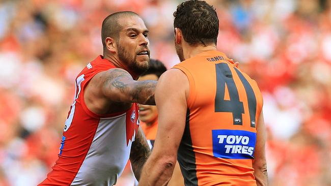 Lance Franklin and Shane Mumford get into a push and shove. Picture: Toby Zerna