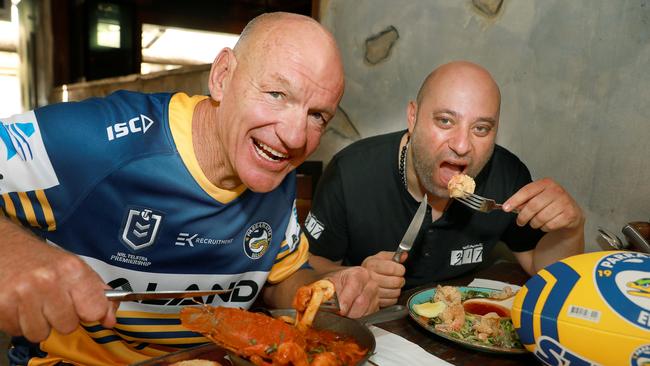 Eels legend Peter Wynn and Restaurant 317 owner Pierre Sande fuel up for the footy season. Picture: Angelo Velardo