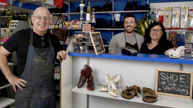 Classic Shoe Repairs proprietor Massimo Sassi, wife Carmel and son Stefano in their store in Grenfell Street. Picture: Naomi Jellicoe