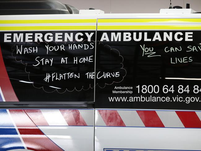 WARNING HOLDING Day in the life ride a long with Mica Paramedic Cullen Hamilton including picking up possible COVID-19 patients. COVID messages written on the side of an ambulance.      Picture: David Caird