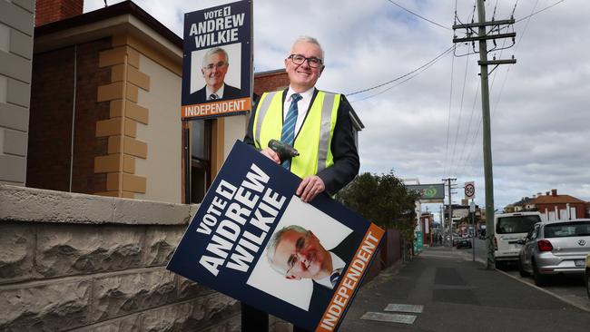 Independent member for Clark Andrew Wilkie out putting up his election campaign posters in Hobart to begin the campaign for re-election. Picture: Nikki Davis-Jones